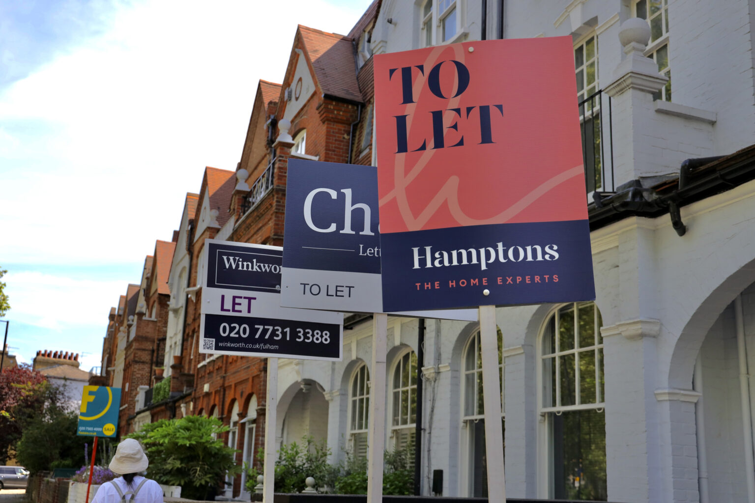 A row of terrace houses in London with 'to let' signs. Rising rents uk rental